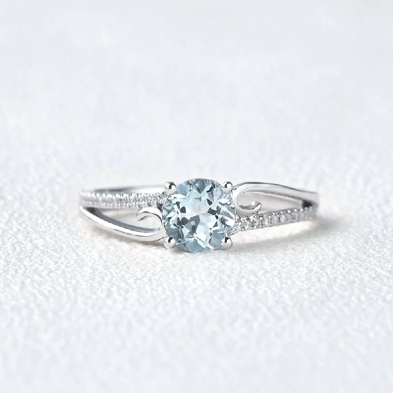 Engagement rings with sleek emerald-cut jade stones -1.0ct Round Cut Aquamarine Vintage Solitaire Twist Ring