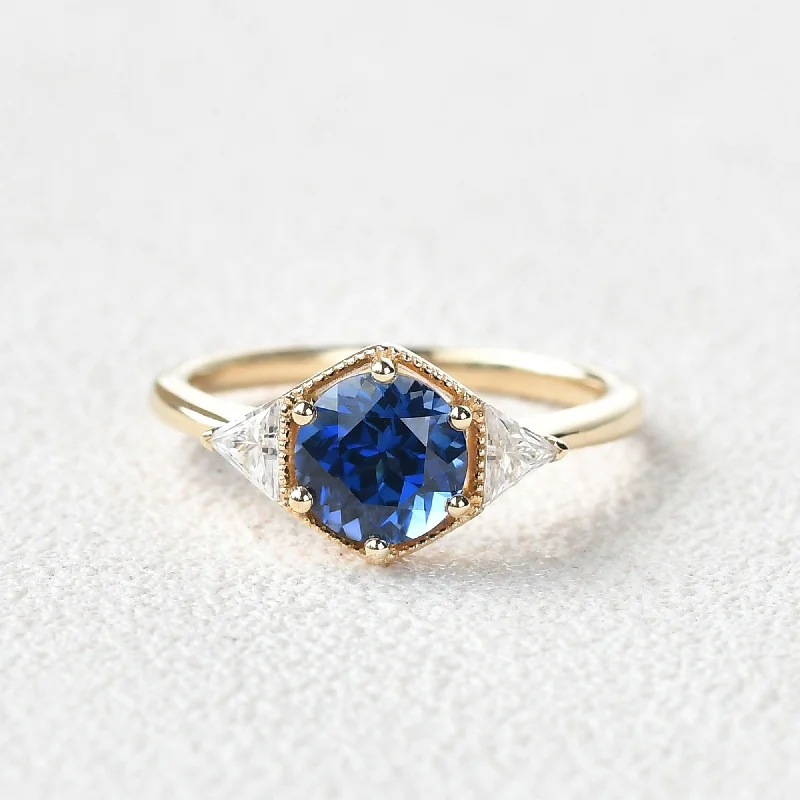 Gold engagement rings with pear-cut sapphire gems -1.5ct Round Cut Sapphire Geometric Ring