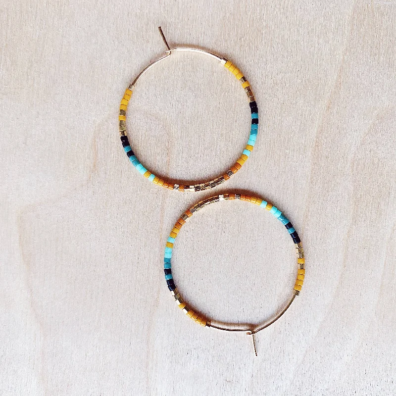 Hoop earrings with open designs for a modern, lighthearted vibe-Serpent Hoops - Island