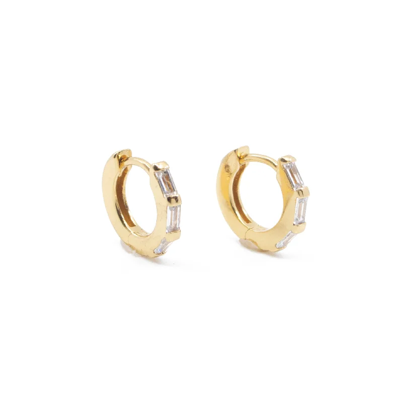 Best hoop earrings with crescent-shaped designs for a bold, moon-inspired style-Clear CZ Baguette Huggie Hoop Earrings in Gold