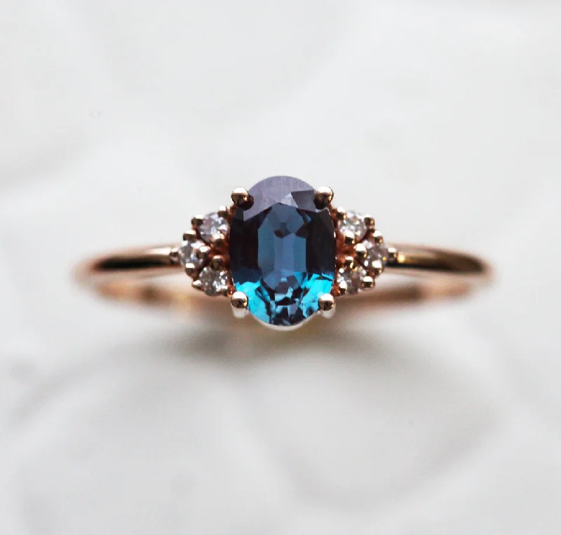 Gold engagement rings with pear-cut sapphire gems -Dora Oval Alexandrite Ring