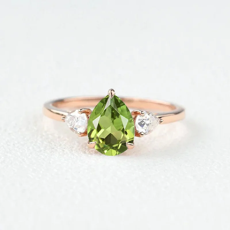 Engagement rings with cluster topaz for dazzle -Pear Shaped Peridot Three Stones Ring