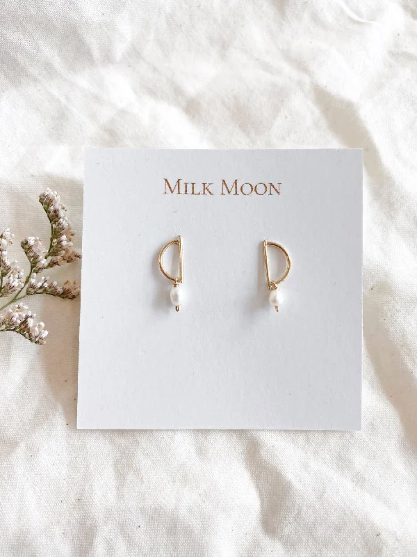 Best hoop earrings with oval shapes for a unique and elongated design-Pearl Half Moon Studs