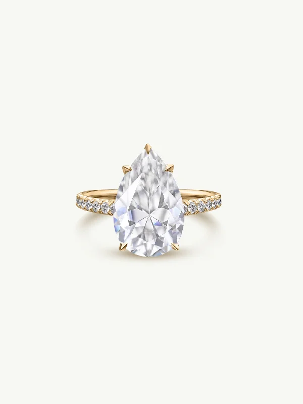 Engagement rings with hidden aquamarine stone accents -Safaa Pear-Shaped Brilliant Cut White Diamond Engagement Ring In 18K Yellow Gold