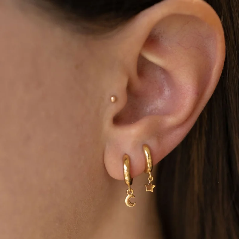 Hoop earrings with abstract shapes for an artistic and creative touch-Star and Moon Huggie Hoop Earrings in Gold