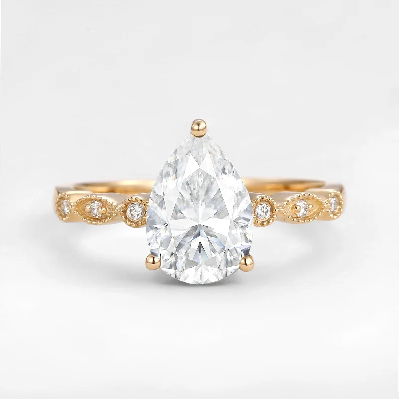 Engagement rings with sunburst aquamarine arrangements -Unique Inspired Pear Shaped Moissanite Engagement Ring